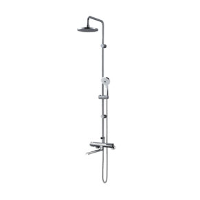 Chrome shower system with an overhead rainfall showerhead and a handheld sprayer on a vertical rail
