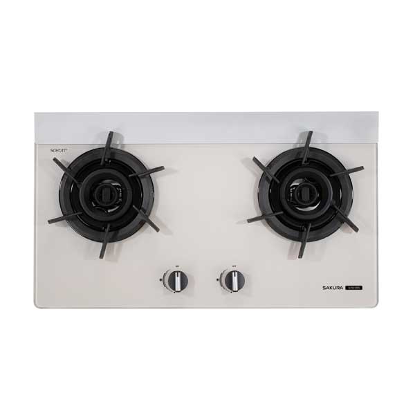 White two-burner gas stove top with black grates and two central control knobs