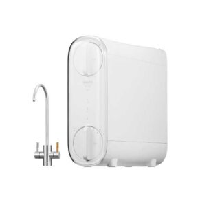 White countertop water filtration system with a transparent front panel and two large control dials, shown with a chrome faucet.