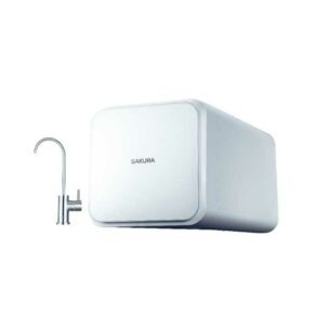 Compact white water purifier unit with a chrome faucet attached, mounted near a sink edge.