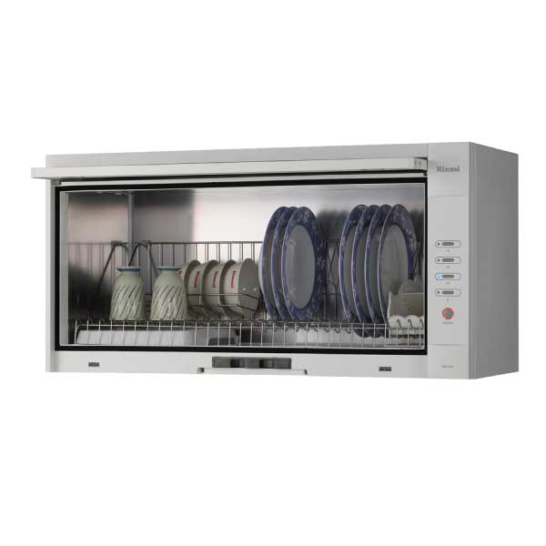 White compact dishwasher with the door open, showing a rack of blue-rimmed plates and mugs inside.