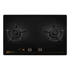 Black glass gas cooktop with two burners and chrome pan supports, front control knobs and a golden accent line at the bottom edge