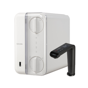 White home water distiller with a clear front panel featuring two large circular knobs and a separate black faucet with a digital display.